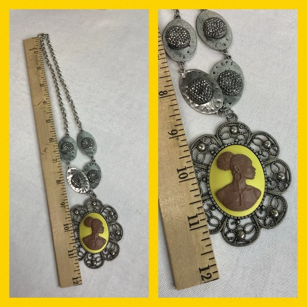 Yellow and silver cameo necklace.